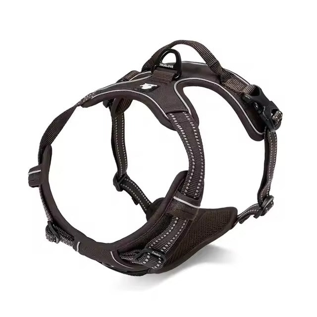 Black adjustable dog harness with reflective straps, padded chest panel, top control handle, and rear leash attachment ring.